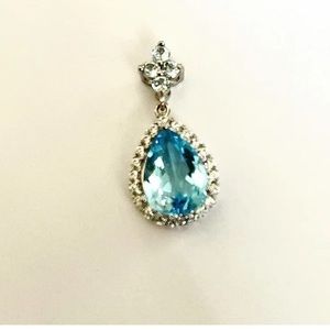 Genuine 5.8 ctw Swiss blue topaz and diamond cute sapphire pendant